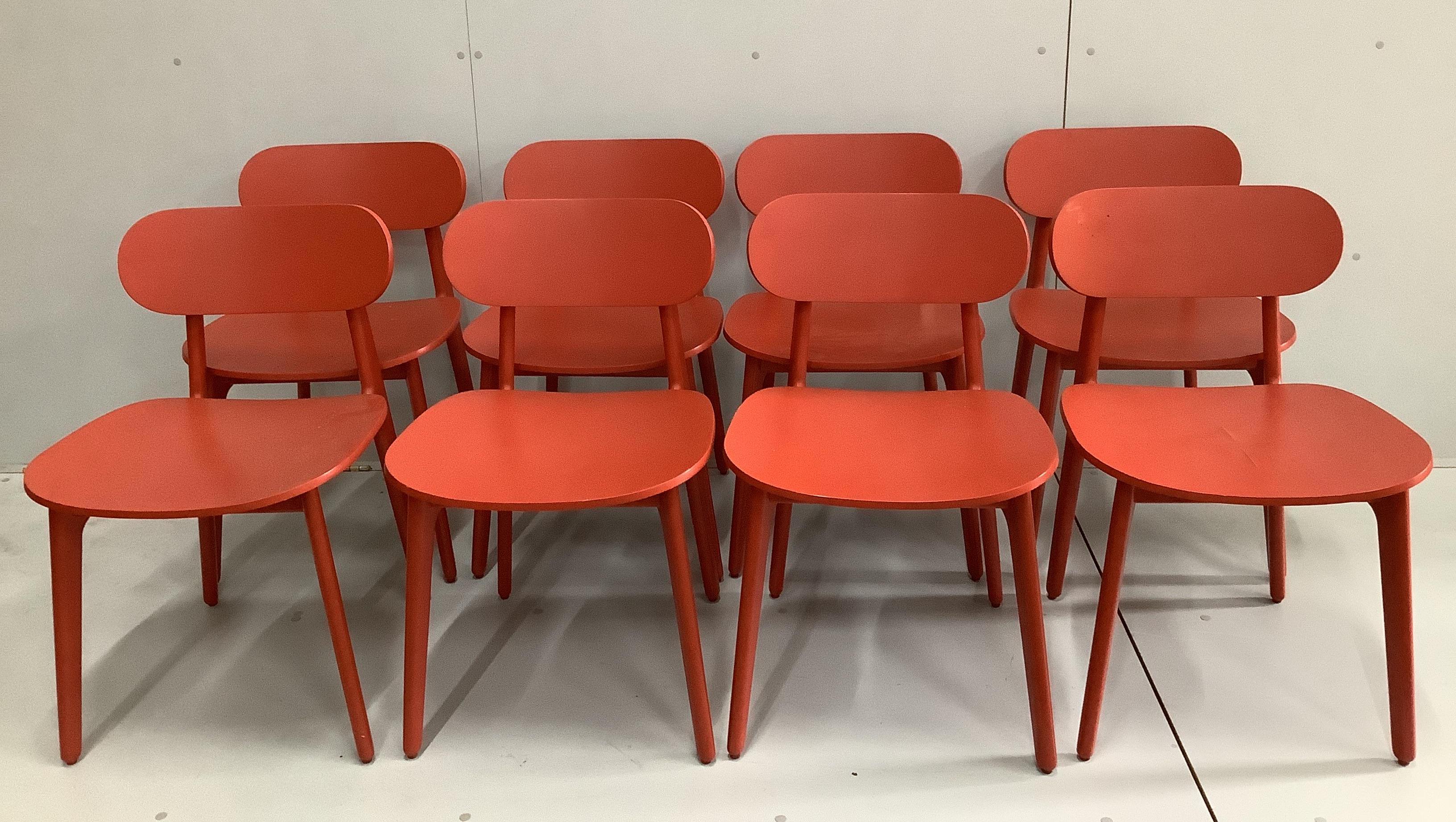 In the manner of Pearson Lloyd, a set of eight PLC type red lacquer oak chairs, width 47cm, depth 50cm, height 75cm